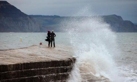 Waves crash against the Cobb.